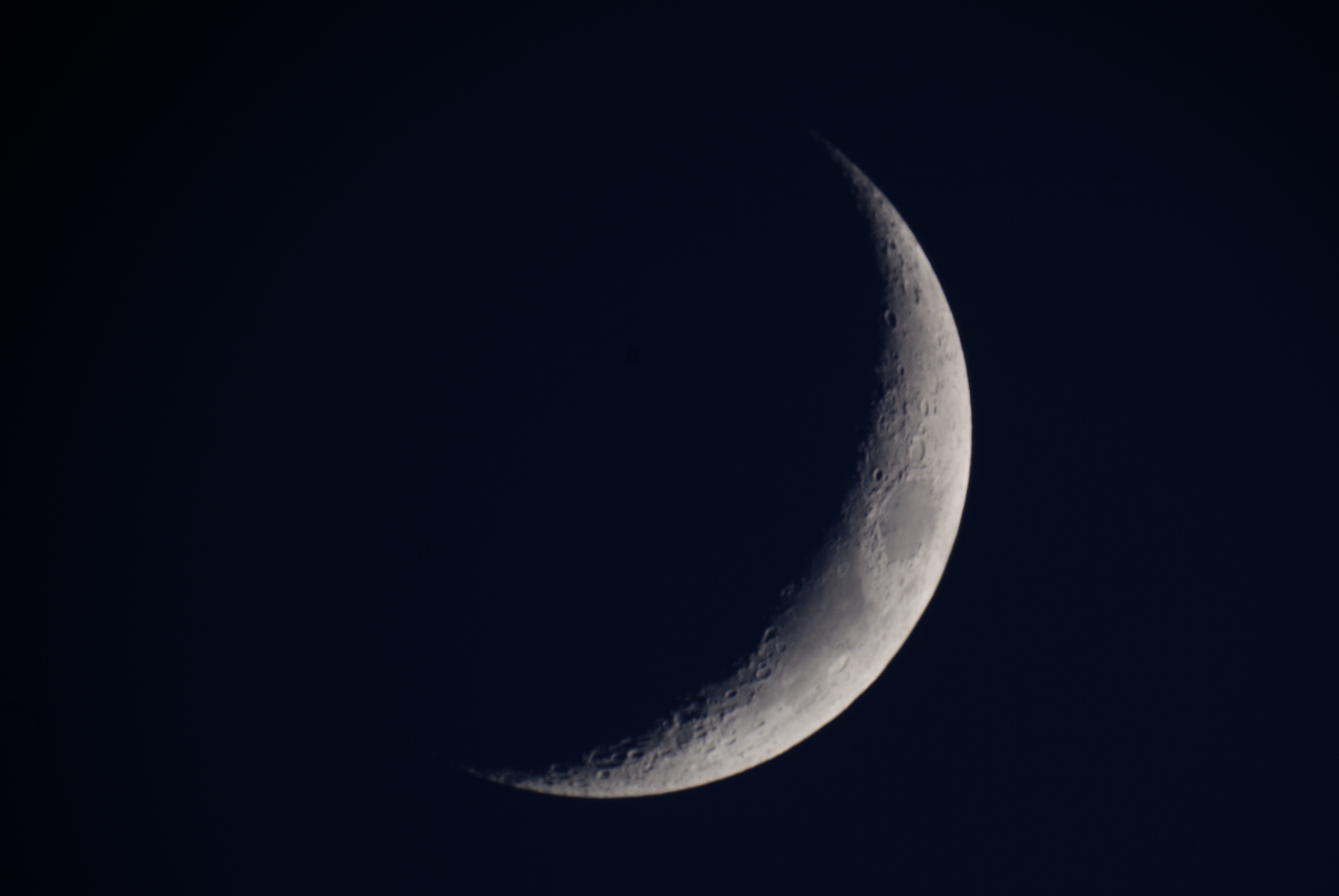 Moon by Bill Samson.  I got this shot of the crescent moon last night (19 04 2018) at 19.51 UT using a Skywatcher Skymax 102 with a Sony A330 DSLR at prime focus -1/10 sec at f12.